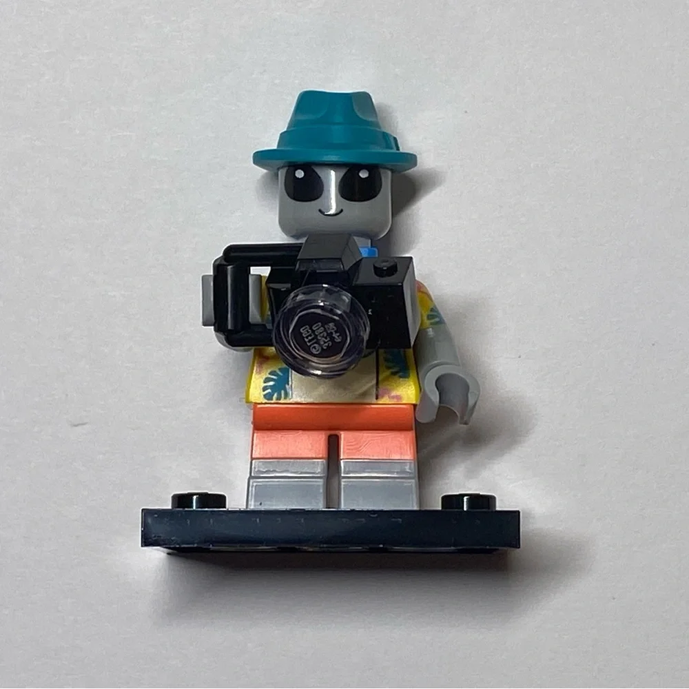 Blue and Orange Simulated Camera Figurine with Black Camera